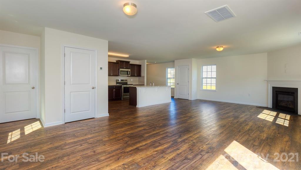 328 Gaines Road Clover, SC 29710 - Photo 13 of 34 a view of a kitchen and an empty room with a window