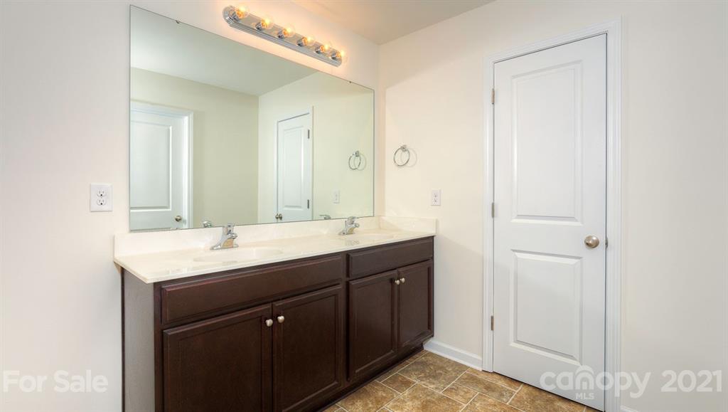 328 Gaines Road Clover, SC 29710 - Photo 20 of 34 a bathroom with a sink and a mirror