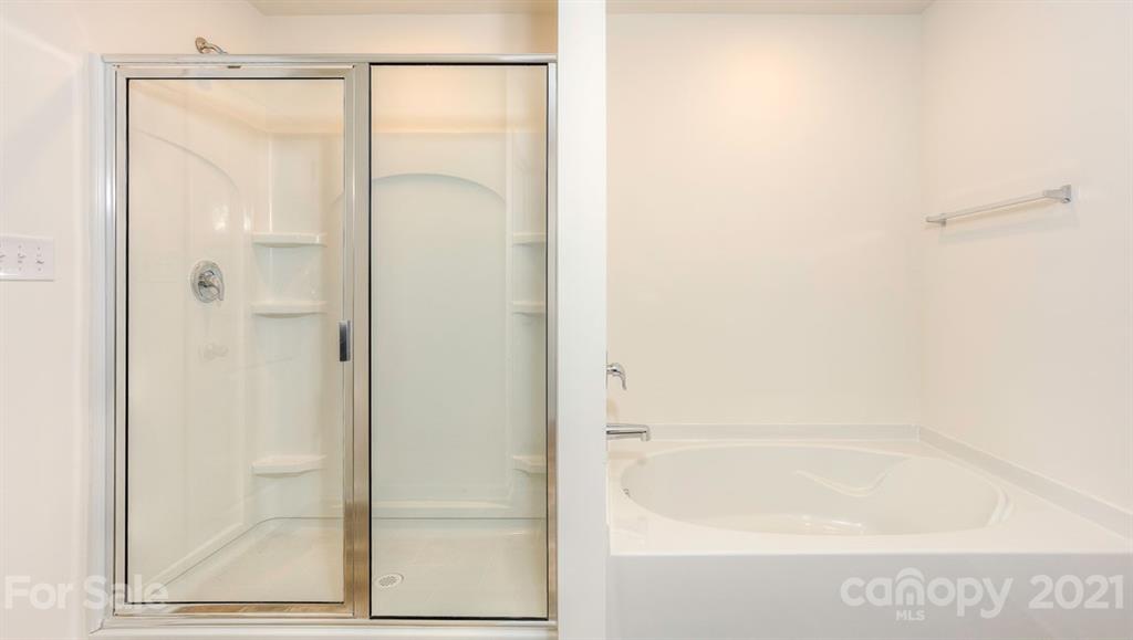 328 Gaines Road Clover, SC 29710 - Photo 22 of 34 a bathroom with a glass shower door