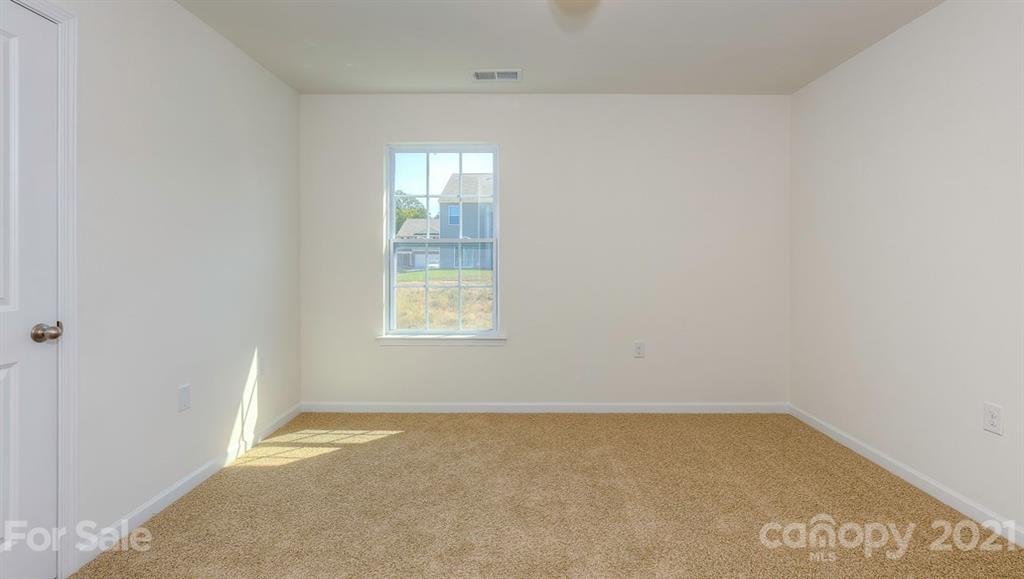 328 Gaines Road Clover, SC 29710 - Photo 29 of 34 an empty room with a window