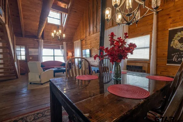 a view of a dining room with furniture