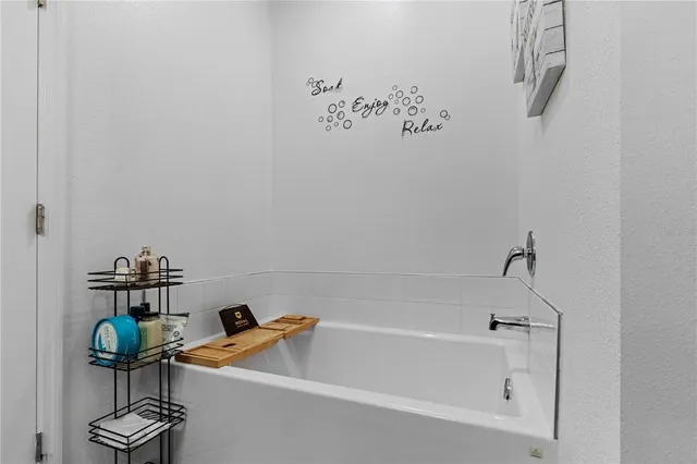 a bathroom with a bathtub