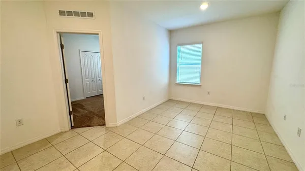 an empty room with a door