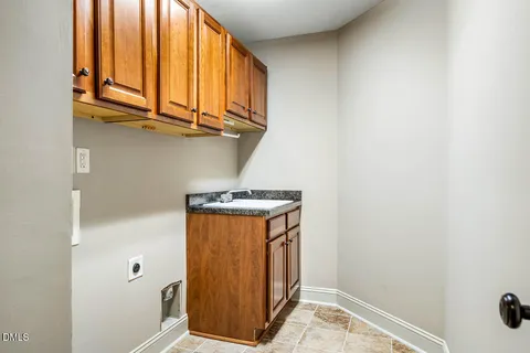 a view of storage and utility room with washer and dryer