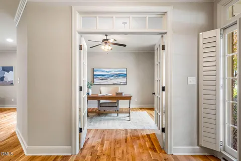 a view of a bedroom from a hallway