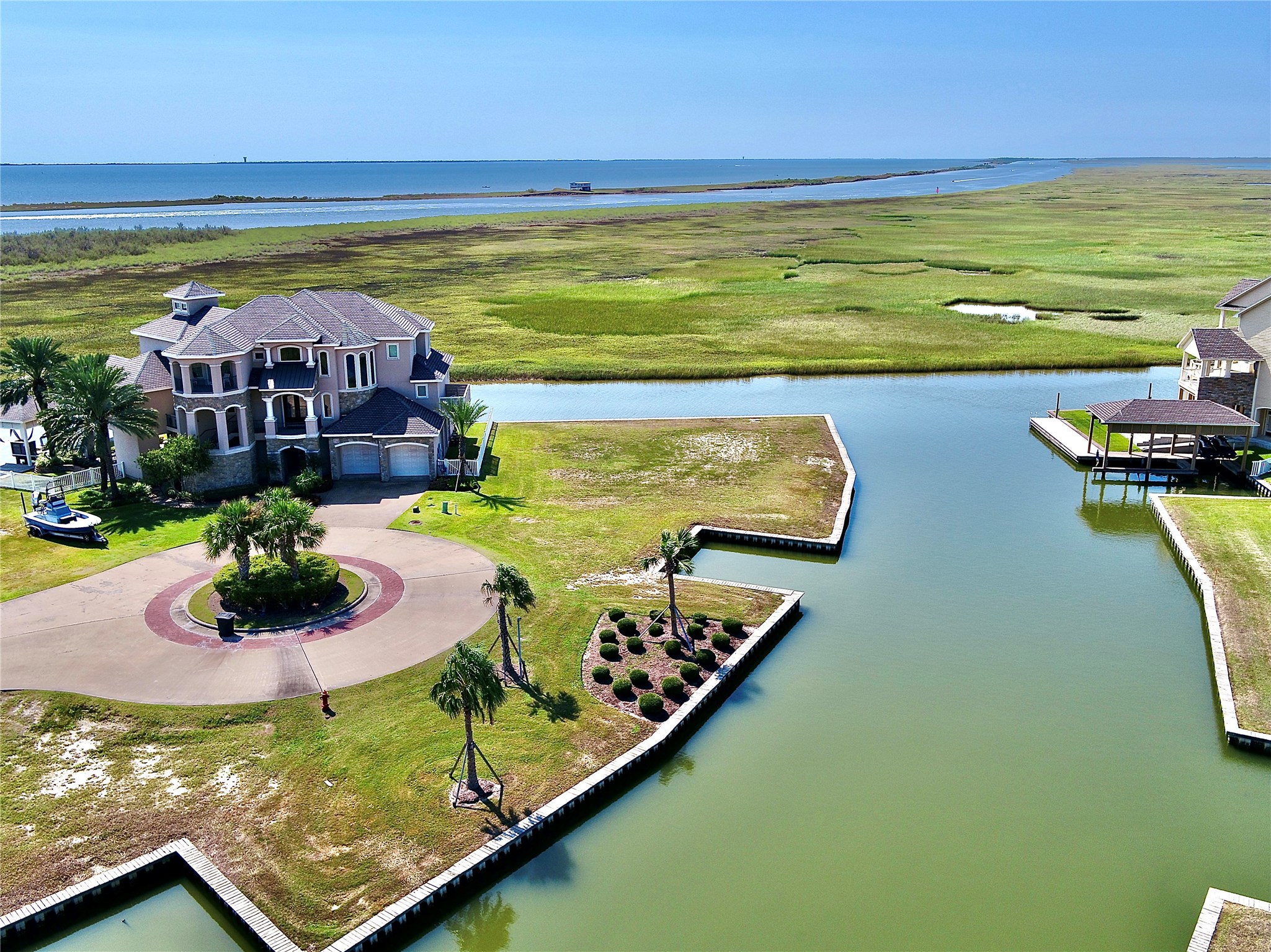 2 Little Torch Hitchcock, TX 77563 - Photo 26 of 49 a view of a swimming pool with an ocean view