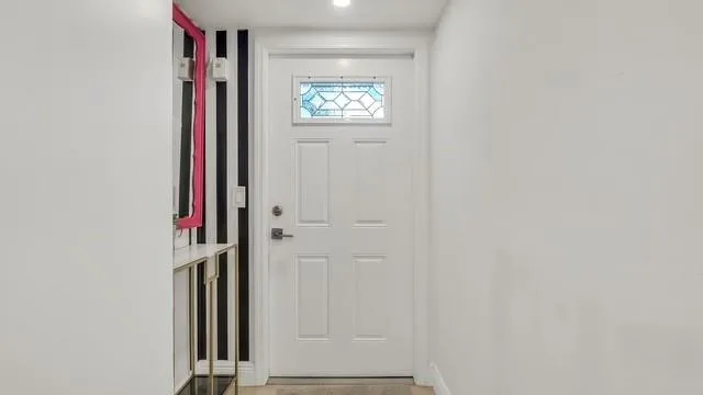 an empty room with windows