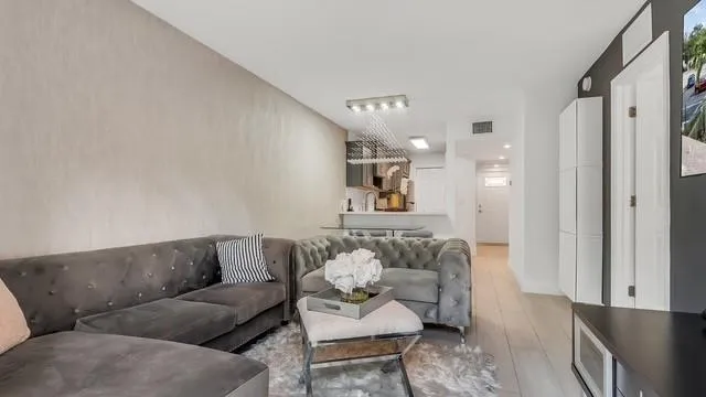 a living room with furniture and a couch