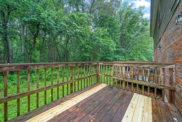 a view of a wooden roof deck
