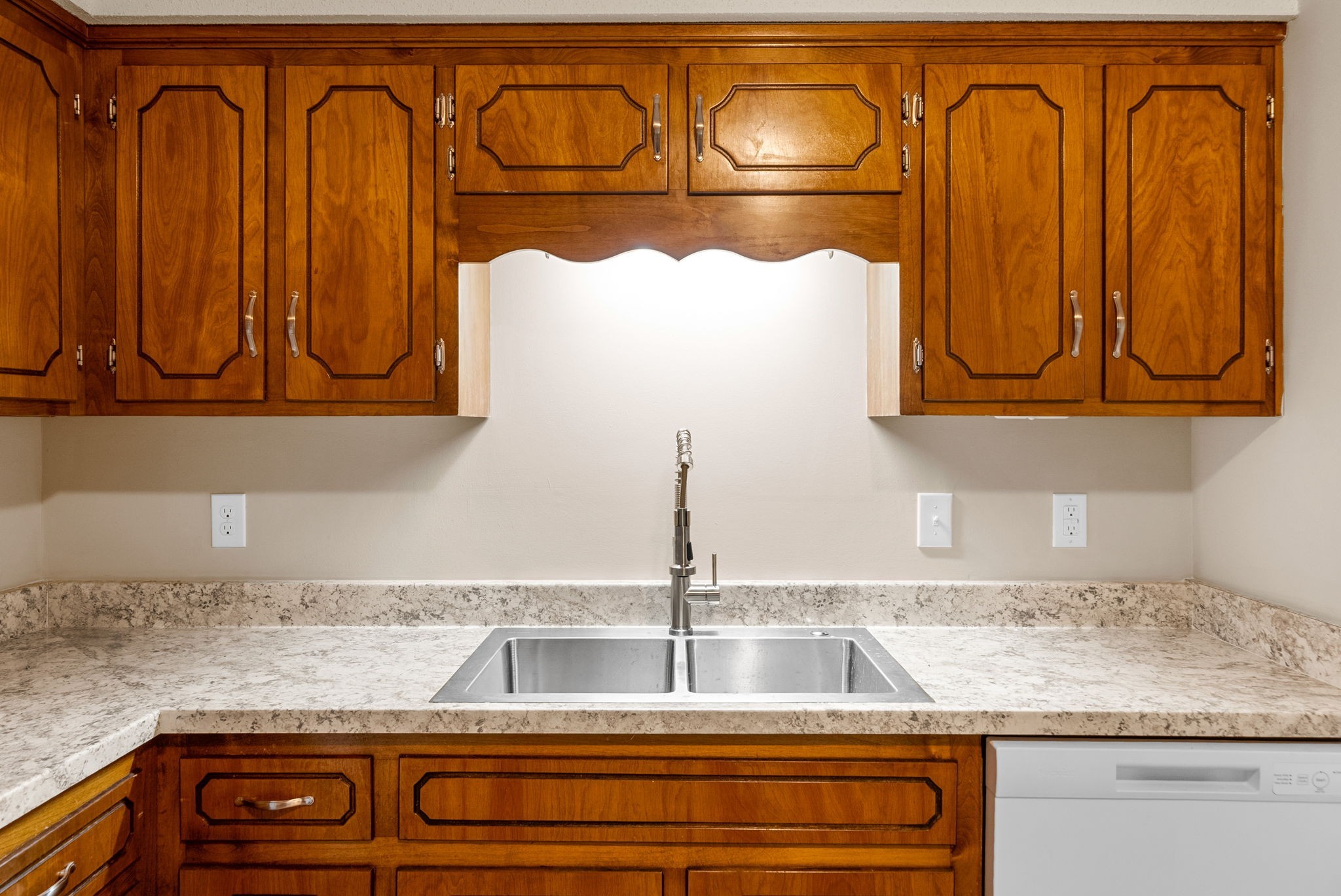 481 Martha Lane, Unit D Clarksville, TN 37043 - Photo 10 of 20 a kitchen with granite countertop a sink and cabinets