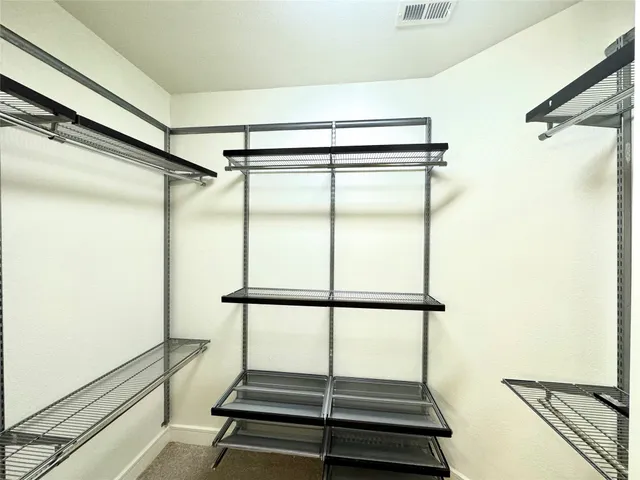 a kitchen with a sink and a stove