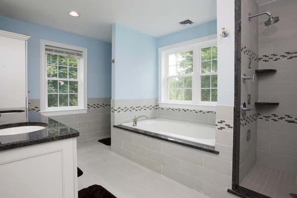 30 Cormier Road Burlington, MA 01803 - Photo 7 of 12 a bathroom with a granite countertop tub sink and a window