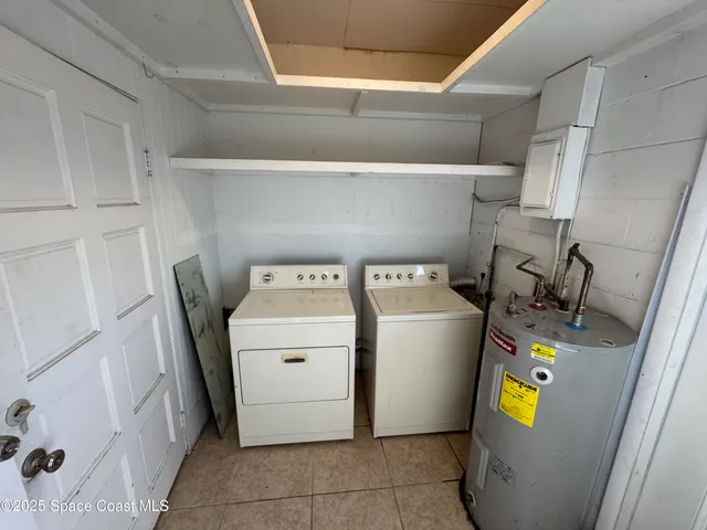 a view of storage and utility room