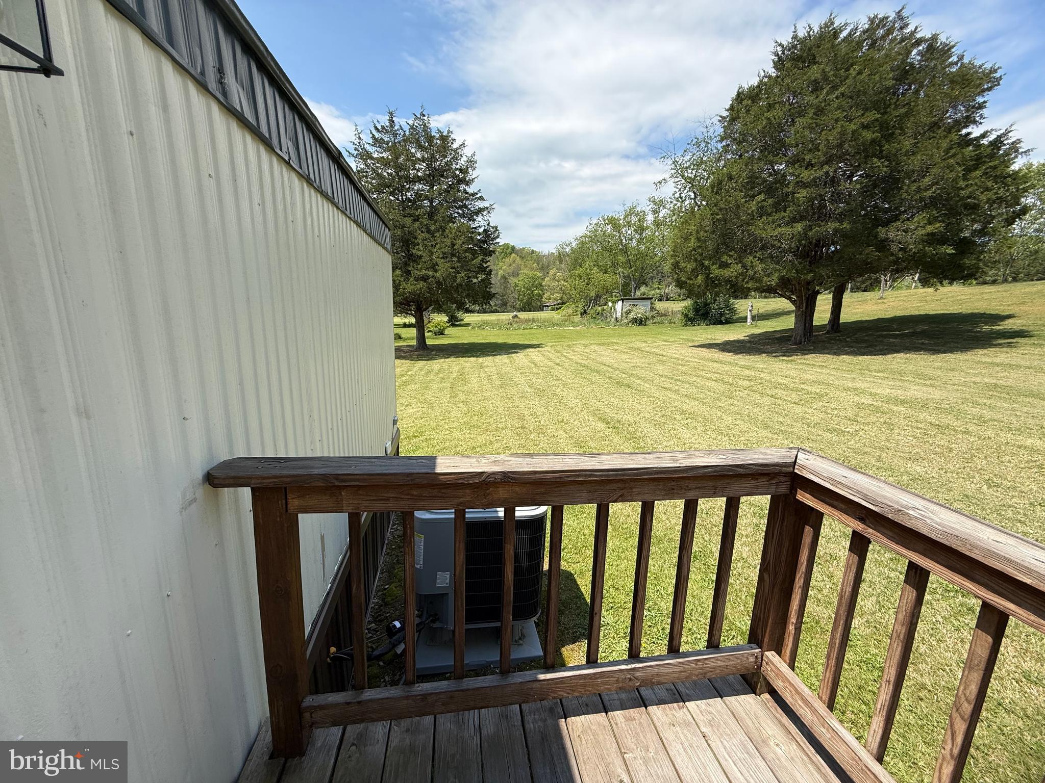 192 AA Rogers Road Augusta, WV 26704 - Photo 28 of 34 a view of a balcony with wooden floor