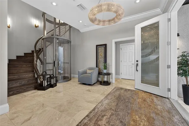 a bathroom with a shower and a glass door