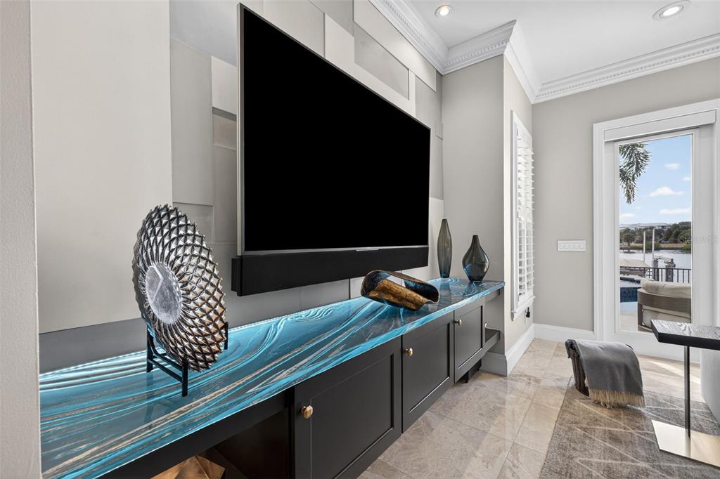 1009 Royal Pass Road Tampa, FL 33602 - Photo 22 of 74 a living room with furniture and a flat screen tv