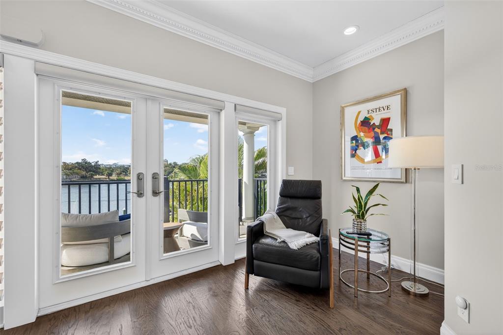 1009 Royal Pass Road Tampa, FL 33602 - Photo 41 of 74 a living room with furniture and a floor to ceiling window