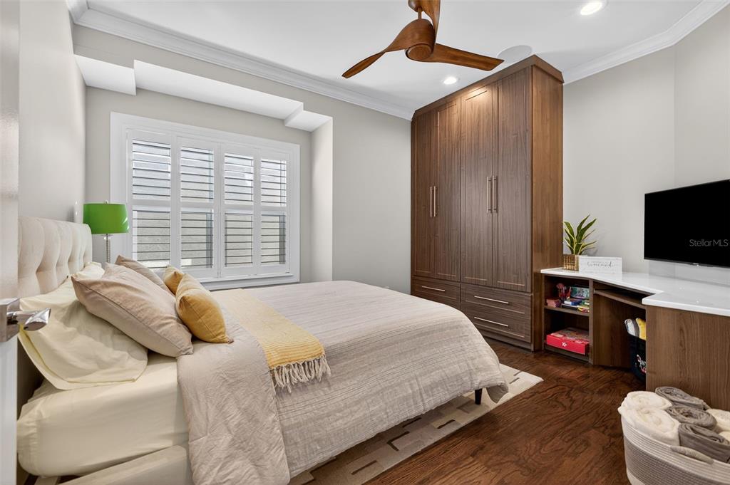 1009 Royal Pass Road Tampa, FL 33602 - Photo 55 of 74 a bedroom with a bed and a flat screen tv