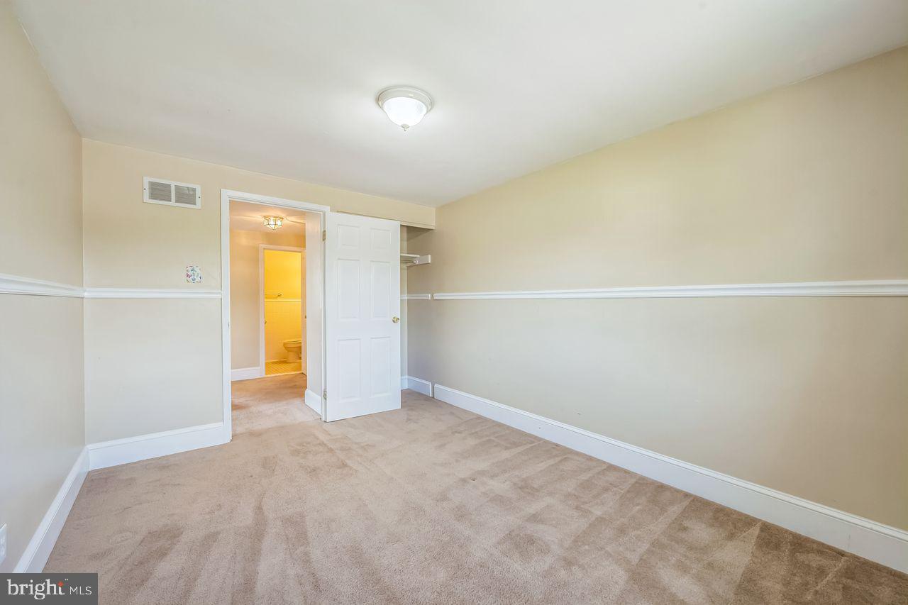 9731 Glenhope Road Philadelphia, PA 19115 - Photo 28 of 36 an empty room with a natural light