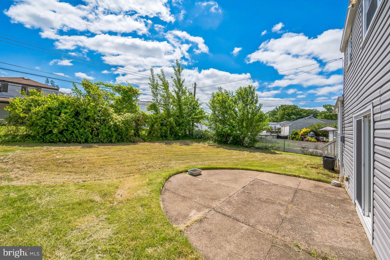 9731 Glenhope Road Philadelphia, PA 19115 - Photo 33 of 36 a view of a yard with an outdoor space