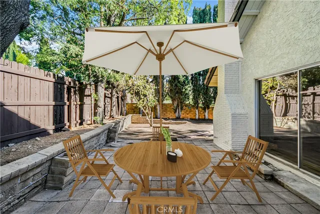 swimming pool view with a seating space