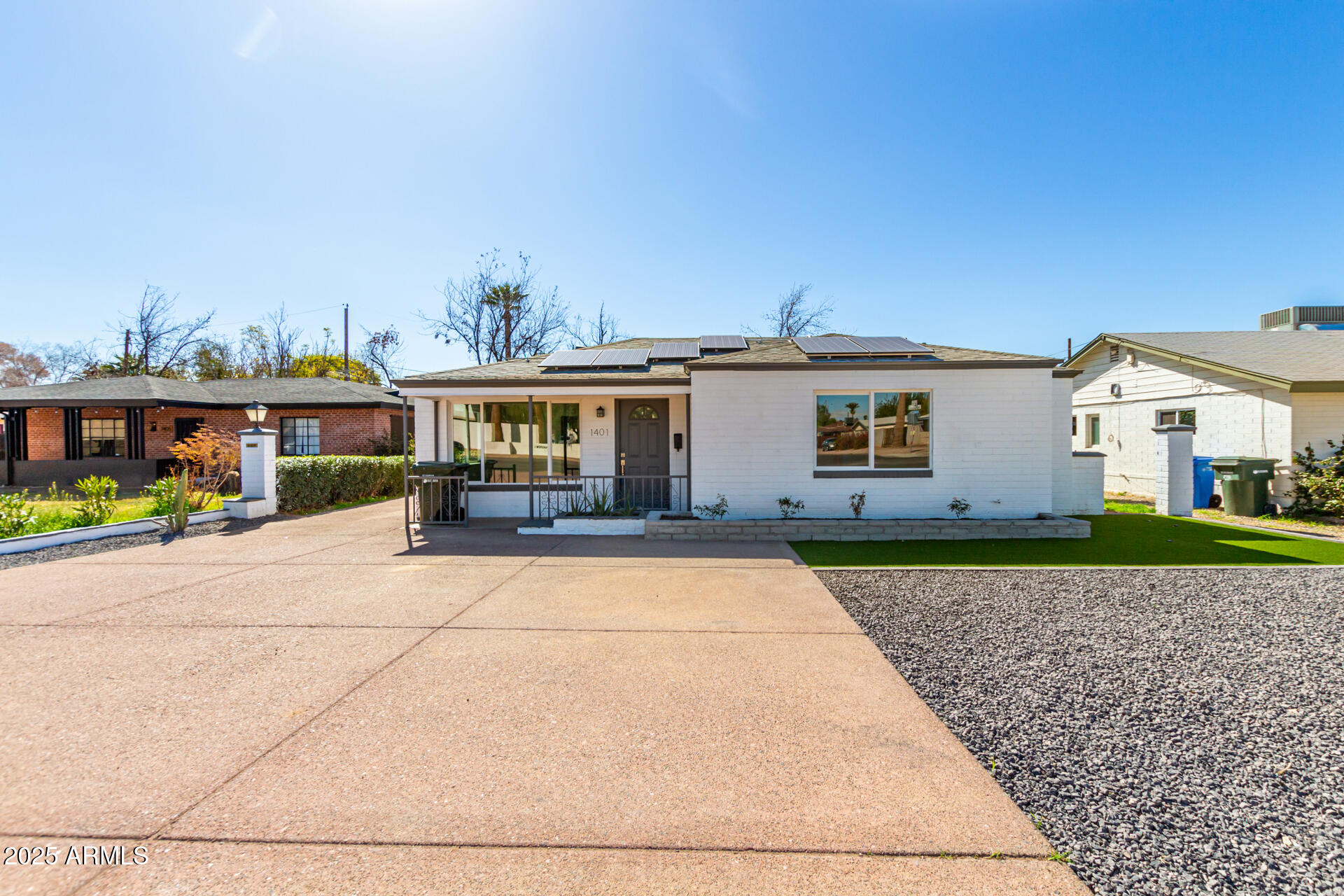 1401 East Osborn Road Phoenix, AZ 85014 - Photo 2 of 36 front view of house with a street