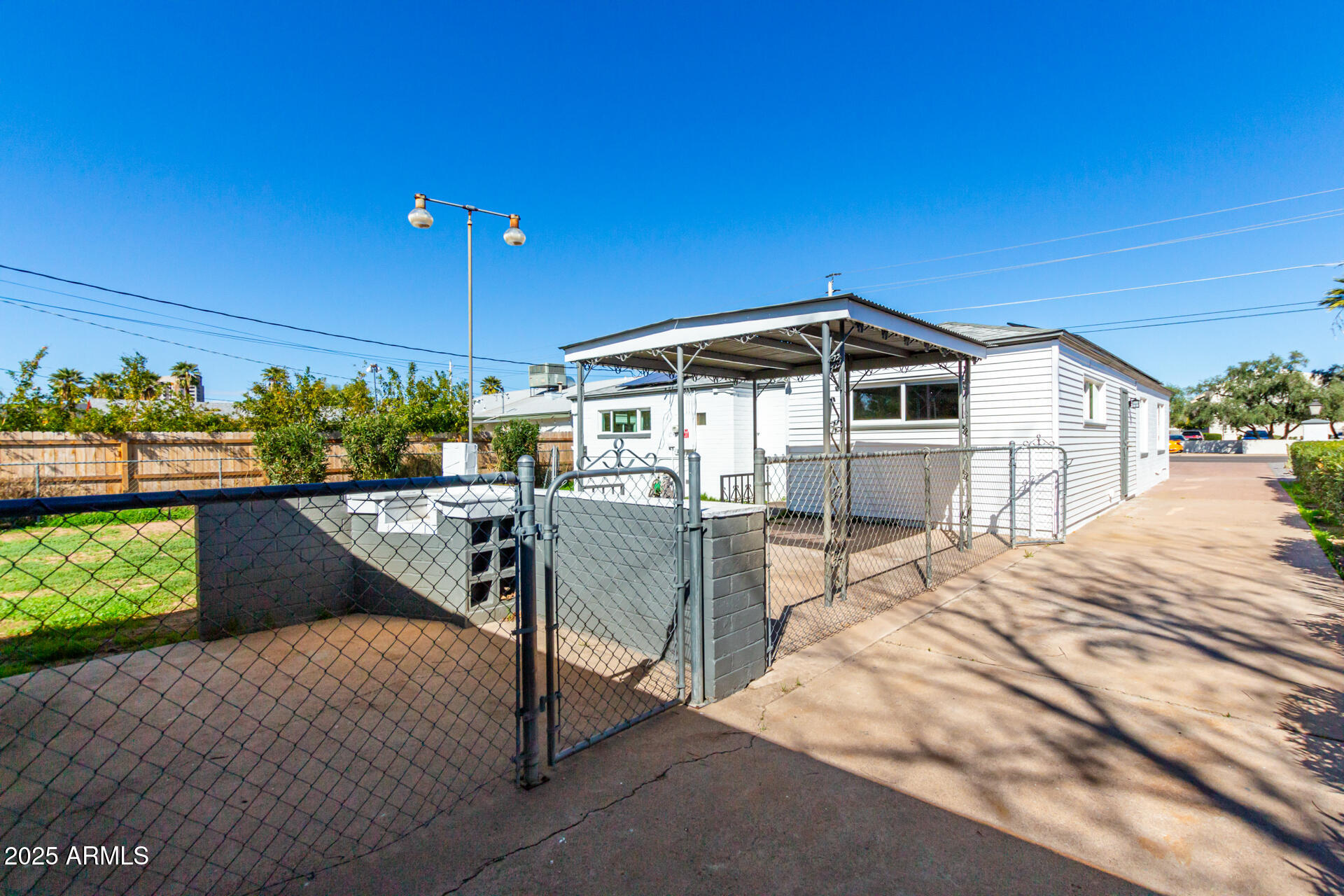 1401 East Osborn Road Phoenix, AZ 85014 - Photo 29 of 36 a view of a house with a patio