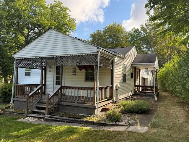 front view of a house with a small yard