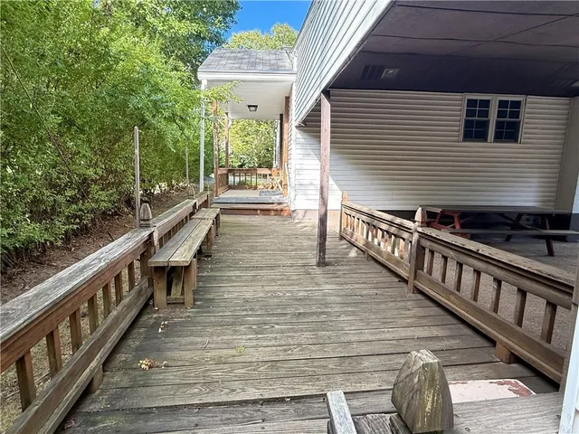 a view of a balcony with chairs