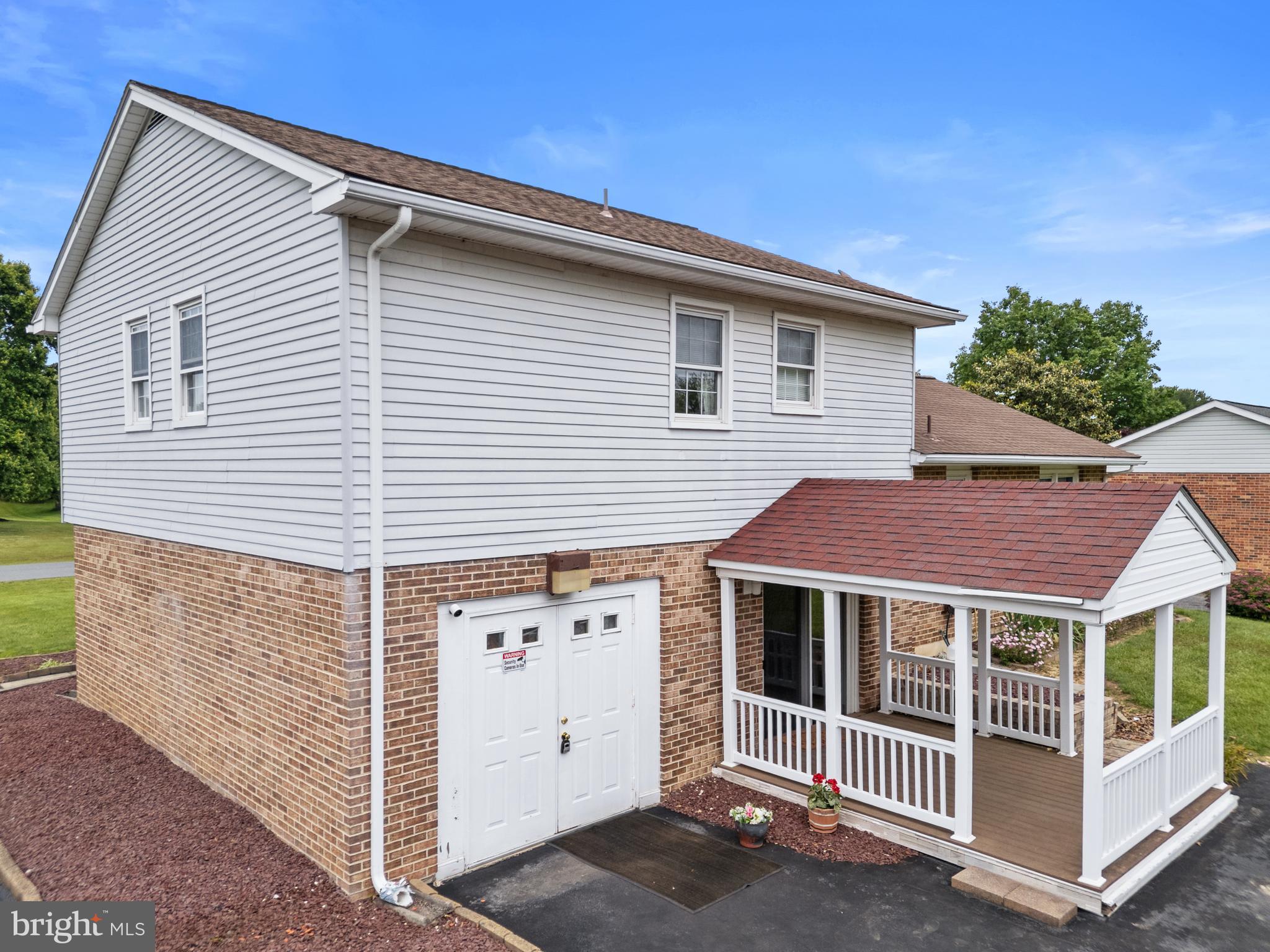 30 Stardust Drive Newark, DE 19702 - Photo 11 of 53 a view of a white house with large windows