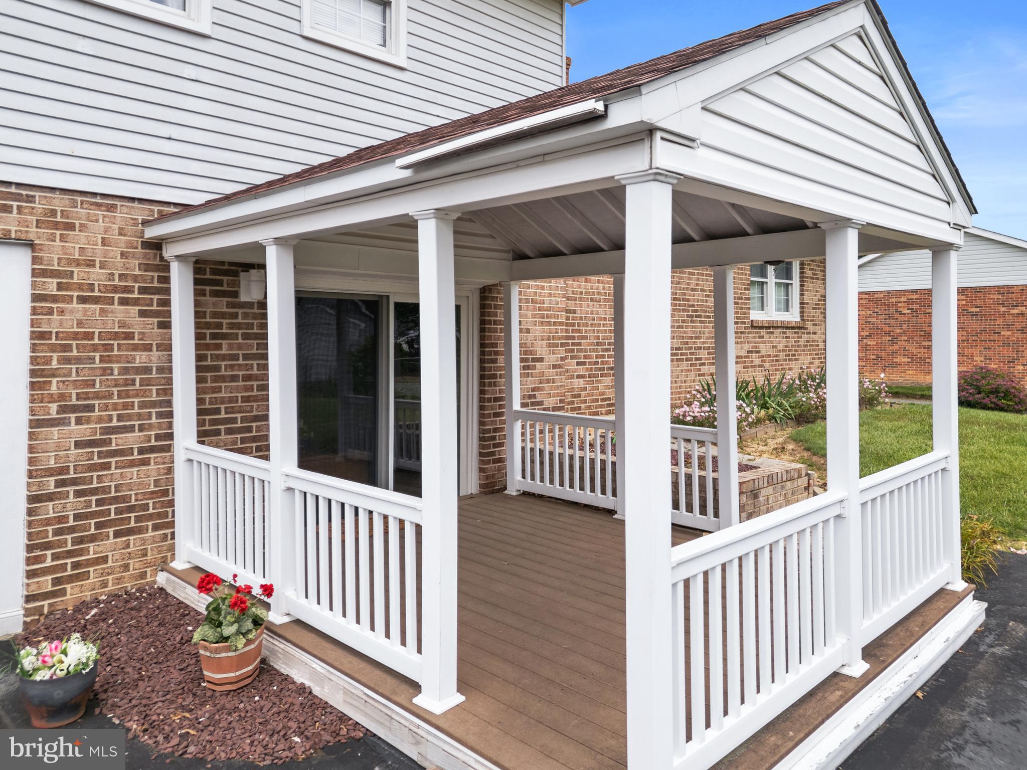30 Stardust Drive Newark, DE 19702 - Photo 14 of 53 a view of a porch with wooden floor