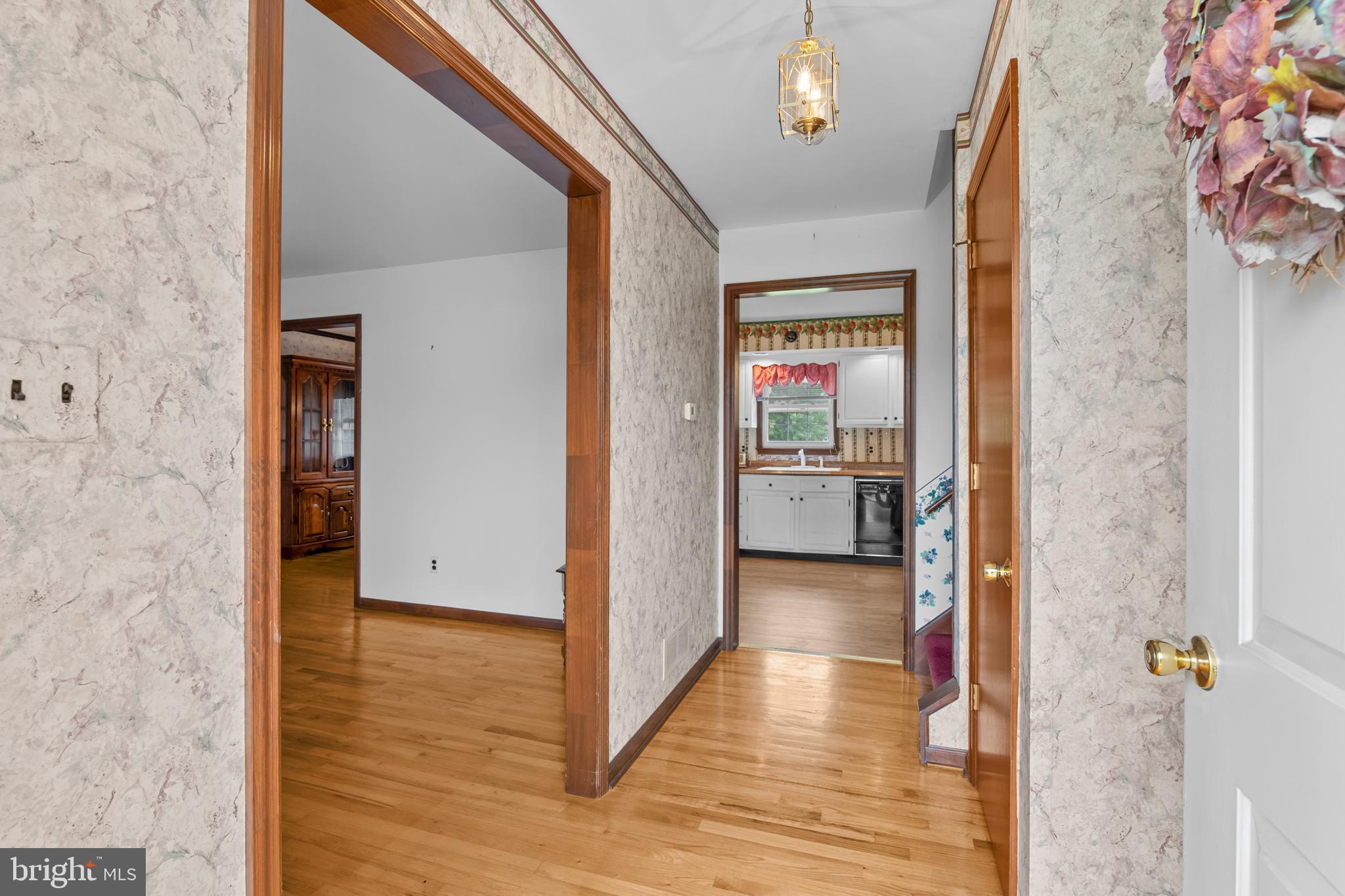 30 Stardust Drive Newark, DE 19702 - Photo 15 of 53 a view of a hallway with wooden floor and closet