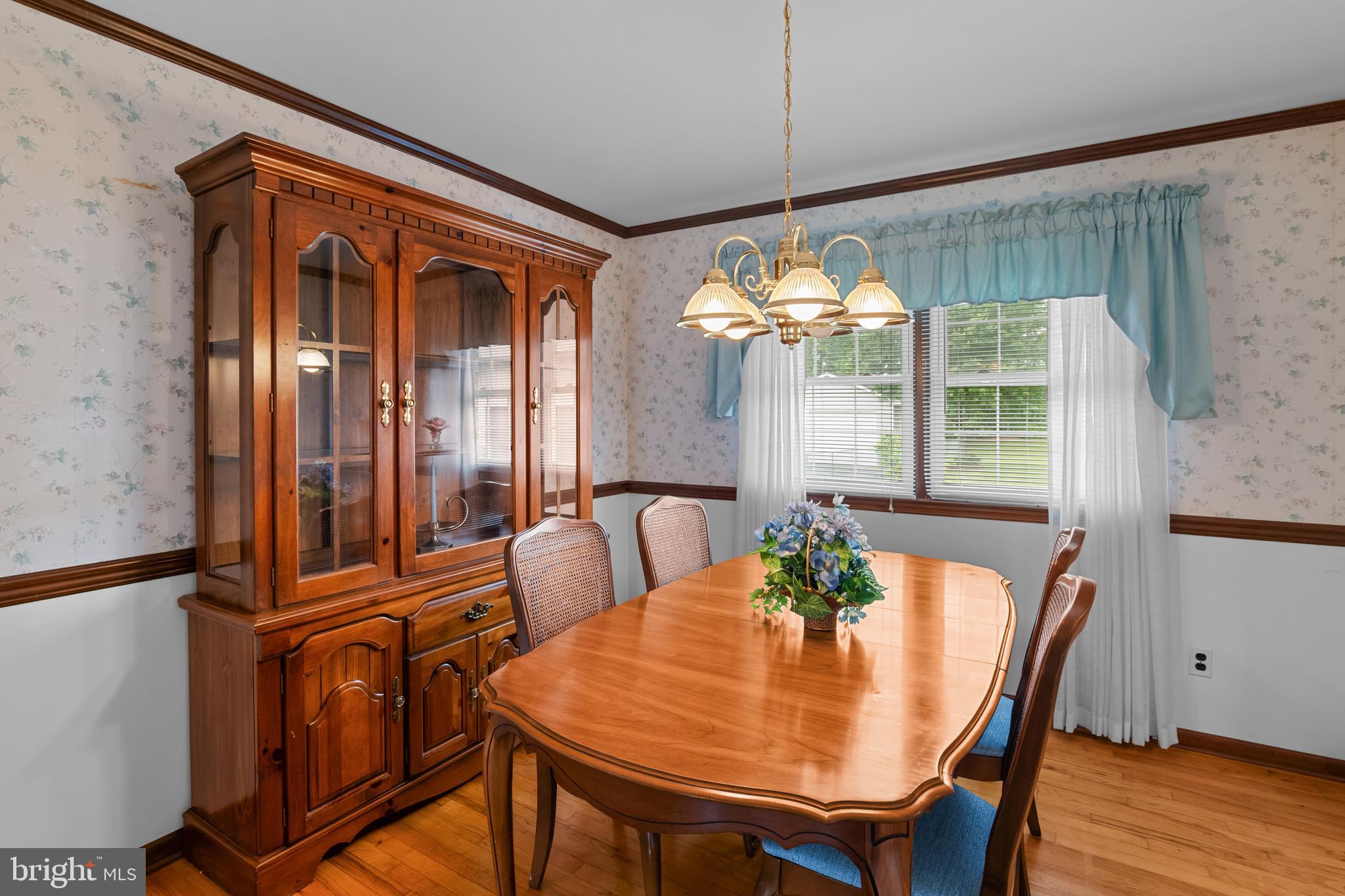 30 Stardust Drive Newark, DE 19702 - Photo 20 of 53 a view of a dining room with furniture window and wooden floor
