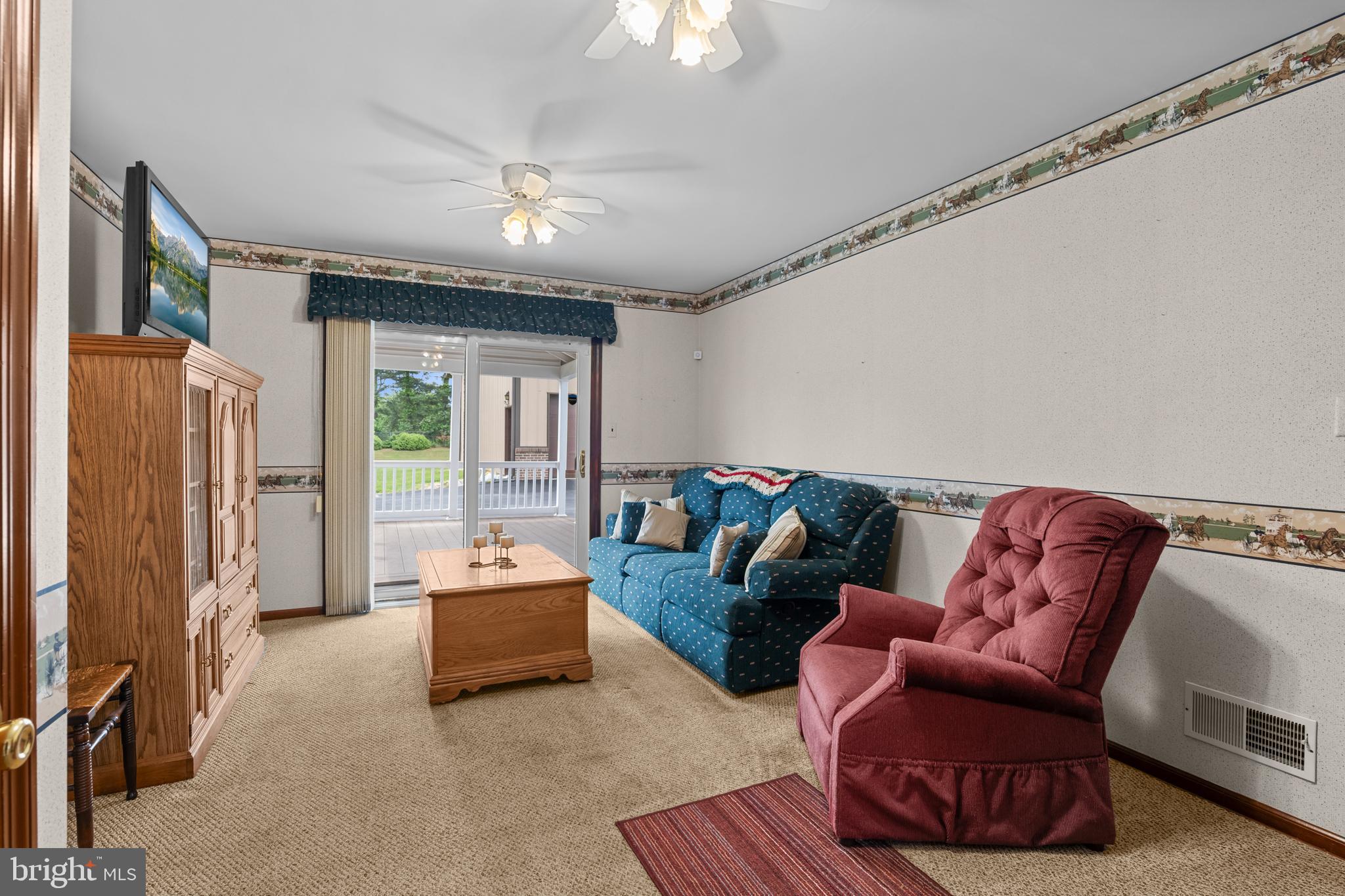30 Stardust Drive Newark, DE 19702 - Photo 27 of 53 a living room with furniture and a flat screen tv