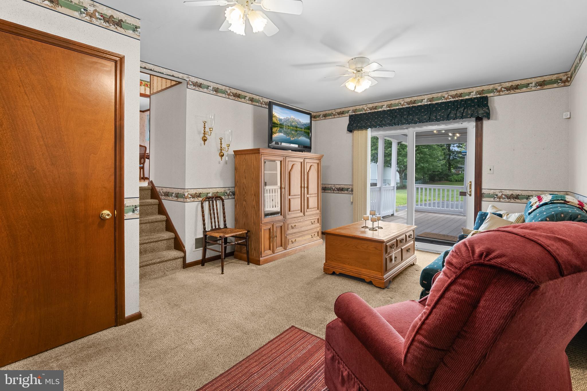 30 Stardust Drive Newark, DE 19702 - Photo 29 of 53 a living room with furniture a large window and stainless steel appliances