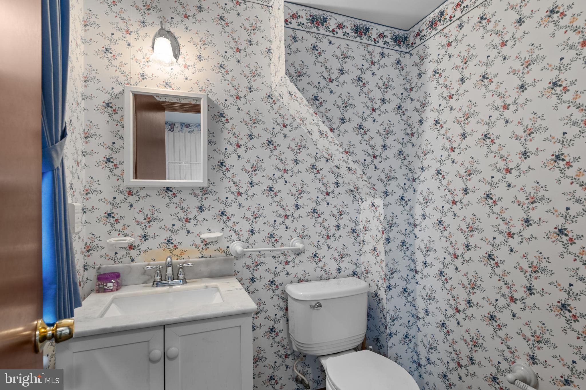 30 Stardust Drive Newark, DE 19702 - Photo 31 of 53 a bathroom with a toilet and a sink