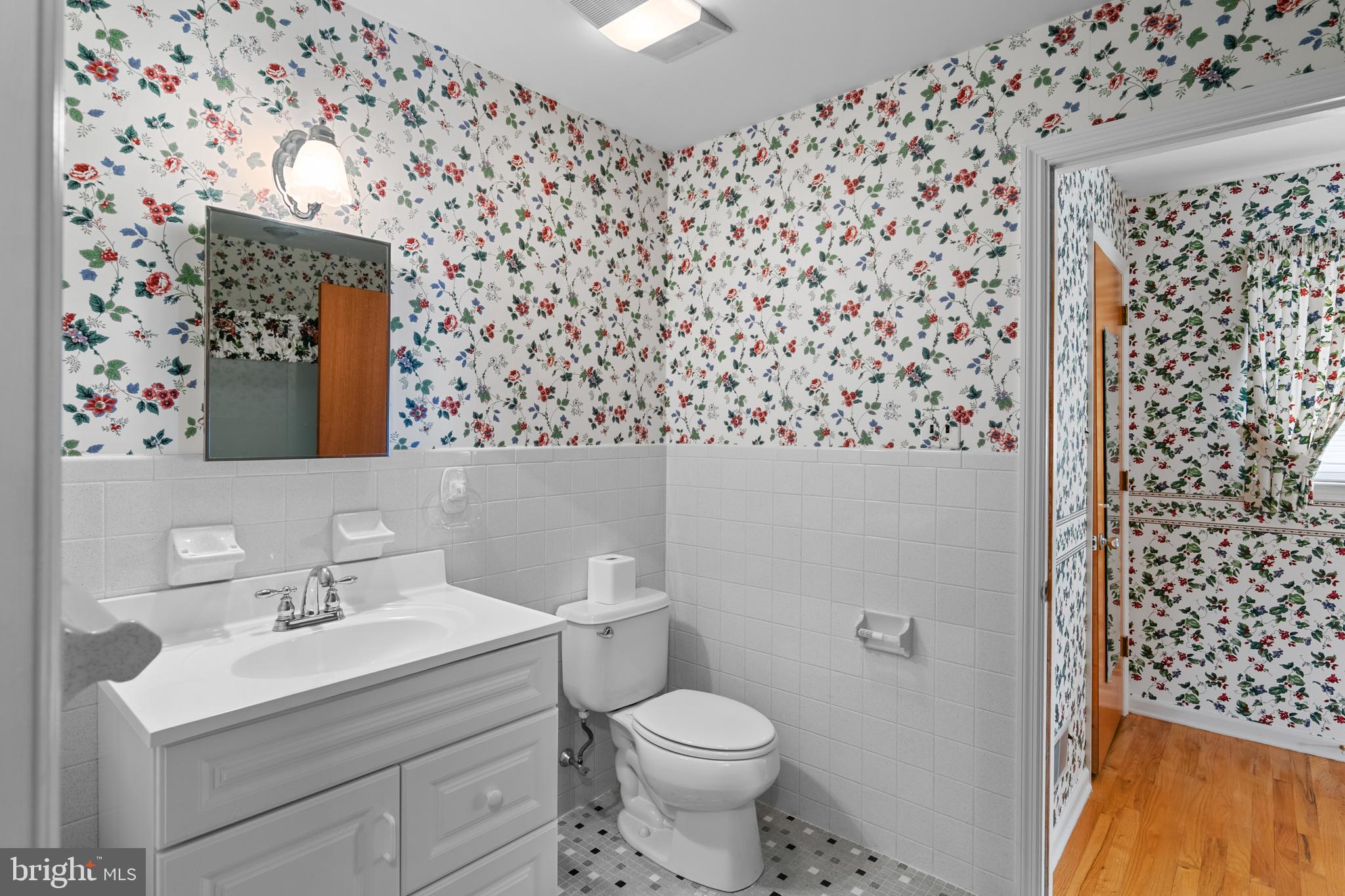 30 Stardust Drive Newark, DE 19702 - Photo 37 of 53 a bathroom with a sink toilet and mirror