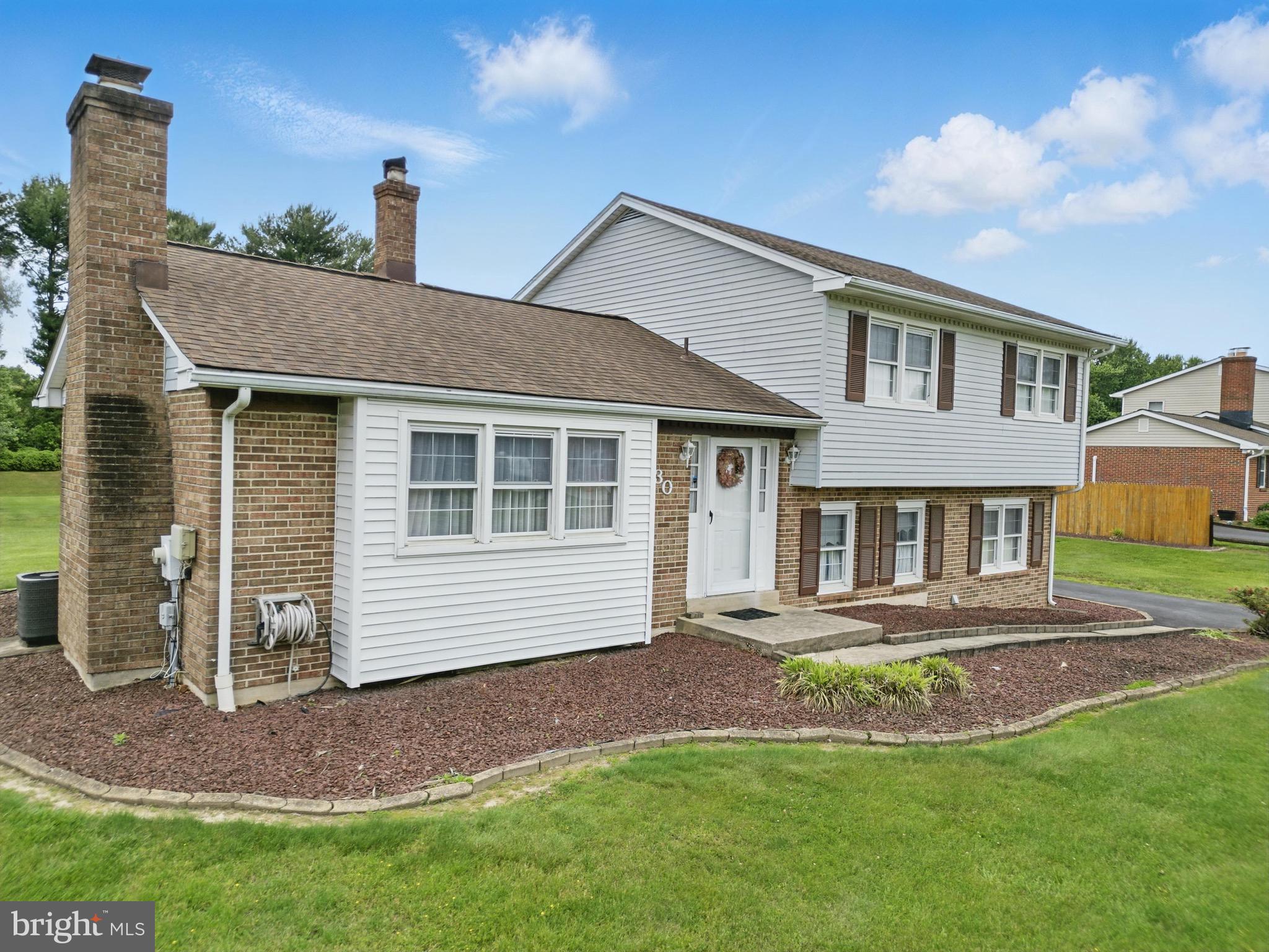 30 Stardust Drive Newark, DE 19702 - Photo 6 of 53 a front view of a house with a yard