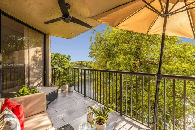 a view of residential houses with swimming pool