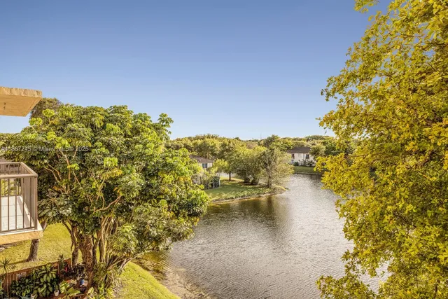 a view of a lake from a balcony