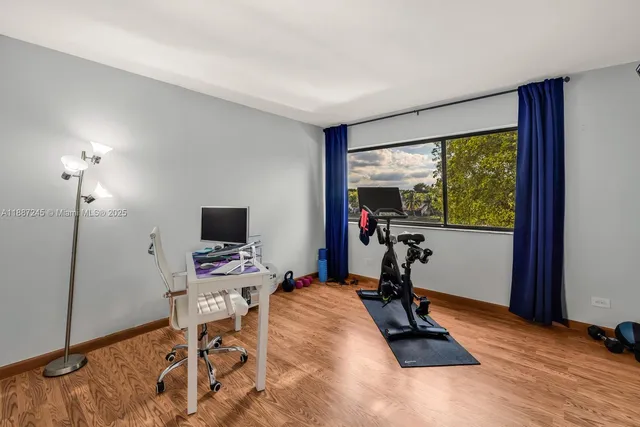 a room with furniture and a window