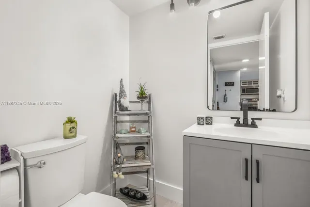 a view of a kitchen with a sink