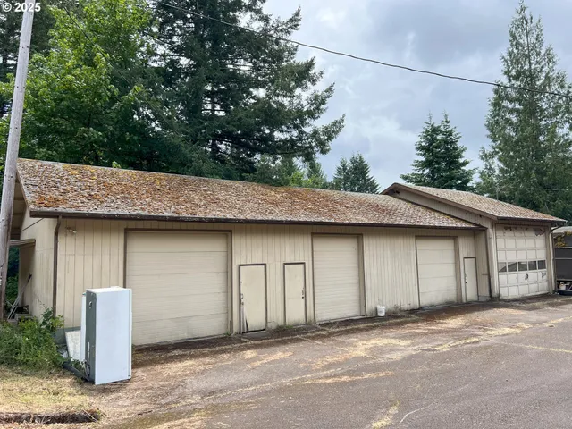 a front view of a house with garage