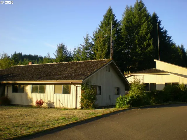 a house with river in front of it
