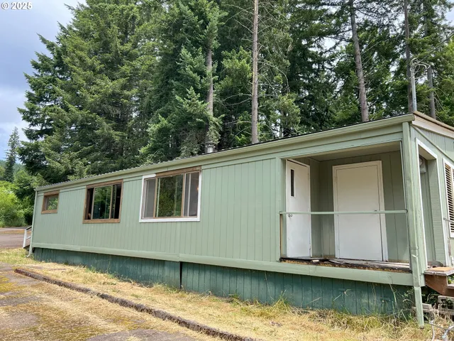 a house with river in front of it