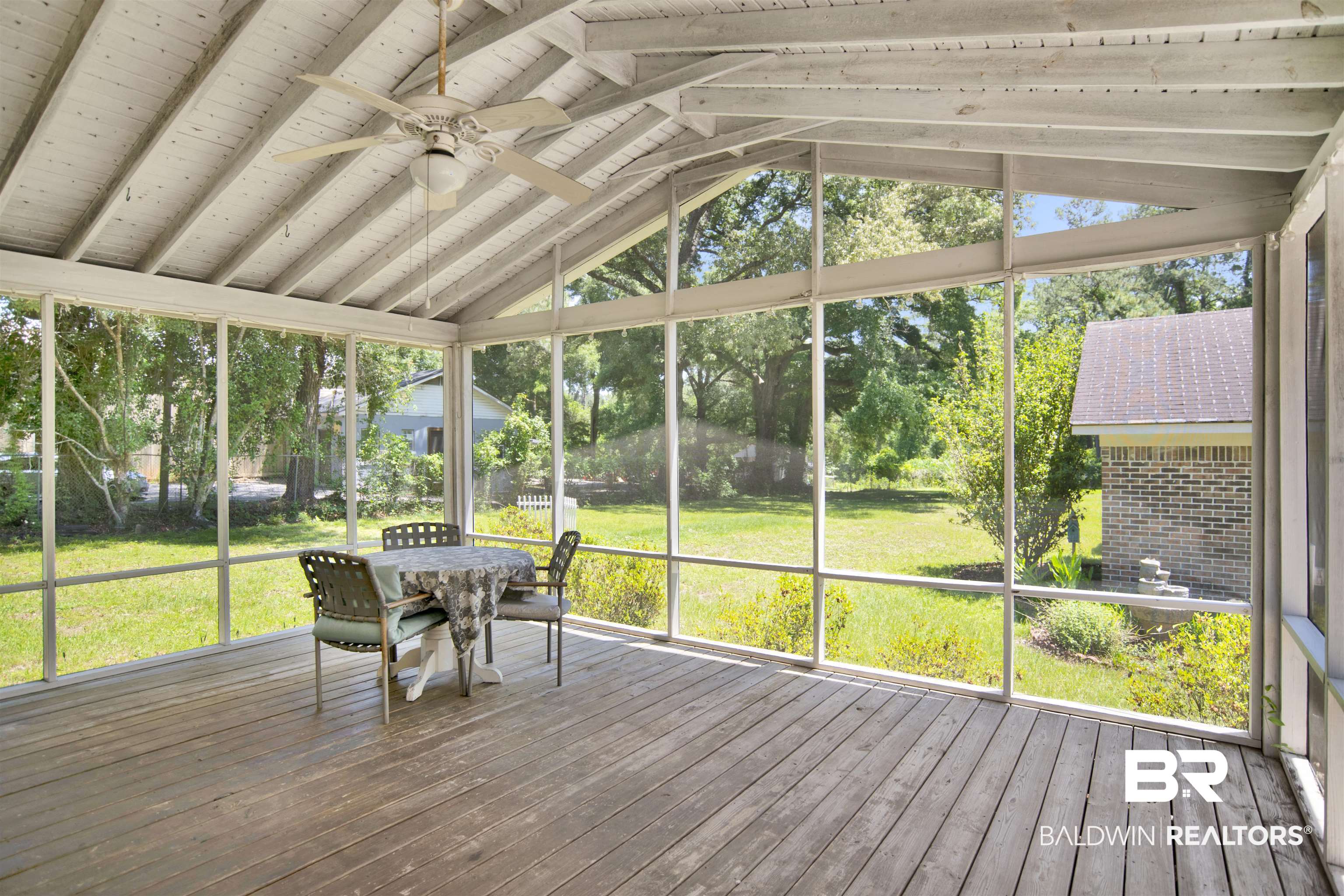 30888 Cemetery Road Daphne, AL 36527 - Photo 23 of 36 Screened porch with wood-finish flooring and a wood-slat ceiling
