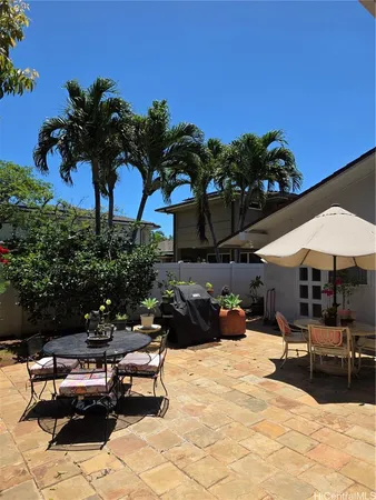 a view of a terrace with furniture