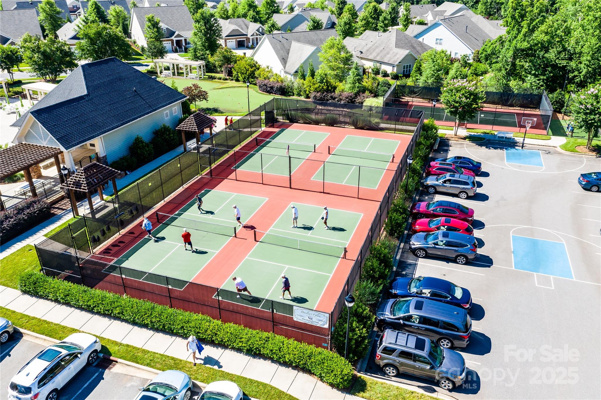 12813 Mayes Road Huntersville, NC 28078 - Photo 7 of 18 an aerial view of a pool patio fire pit and outdoor kitchen