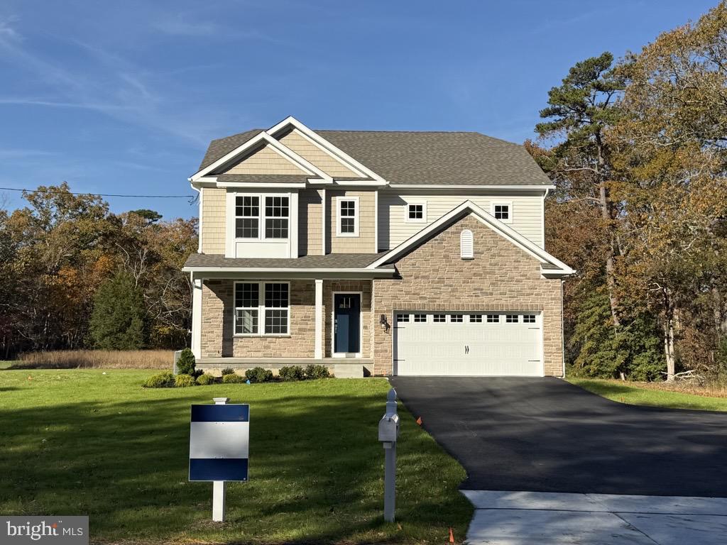 103 New Road Tabernacle, NJ 08088 - Photo 1 of 35 a front view of a house with garden