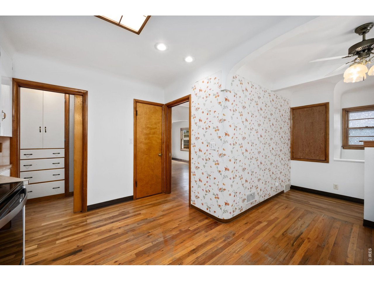 805 Walnut Street Windsor, CO 80550 - Photo 13 of 36 a view of empty room with wooden floor